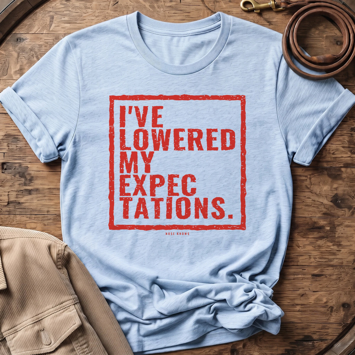 Lowered Exp Unisex tee in Light Blue Heather